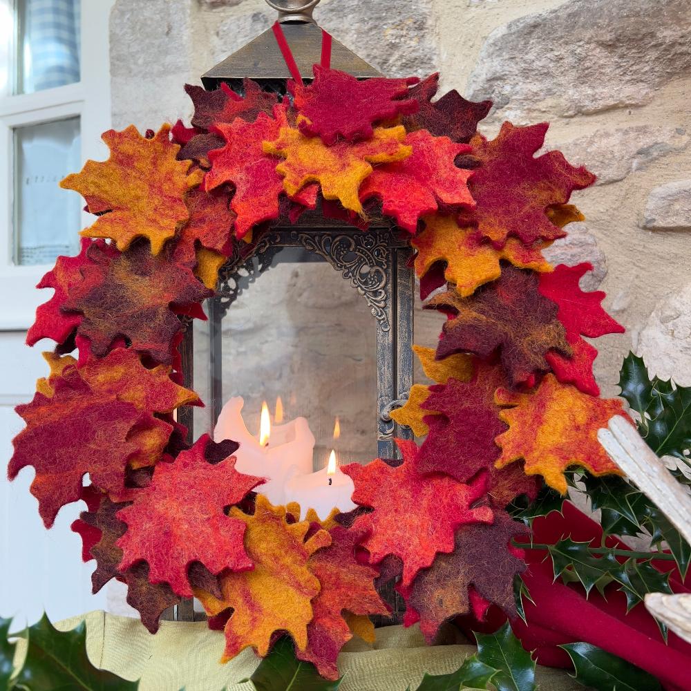 Exquisite Autumn Leaf wreath adds timeless charm to any door or wall all year round.

Handcrafted from pure New Zealand wool, the carefully designed leaves capture the rich, warm hues of autumn foliage. A sustainable piece to cherish and display season after season.