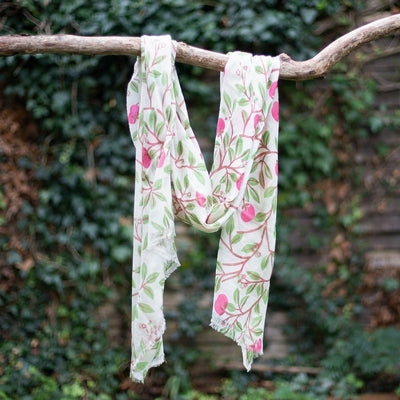 Experience understated luxury with this beautifully crafted cashmere pashmina, adorned with an enchanting cherry blossom motif.

Feather-light yet remarkably warming, it seamlessly transitions through seasons whilst adding refined dimension to your wardrobe.

Handcrafted by accomplished women artisans through an established cooperative, this scarf represents more than mere fashion—it&#39;s a conscious choice that directly empowers skilled craftspeople.