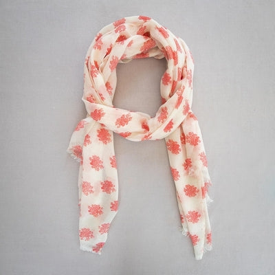 Drape yourself in elegance with this sumptuous cashmere pashmina / scarf, showcasing a striking Red Rose print.&nbsp;

Crafted from the finest cashmere, it delivers exceptional softness and a featherlight feel that belies its warmth. Perfect for layering through transitional seasons or elevating any ensemble with understated luxury.

Each piece is thoughtfully produced through a longstanding cooperative, directly supporting skilled women artisans. 