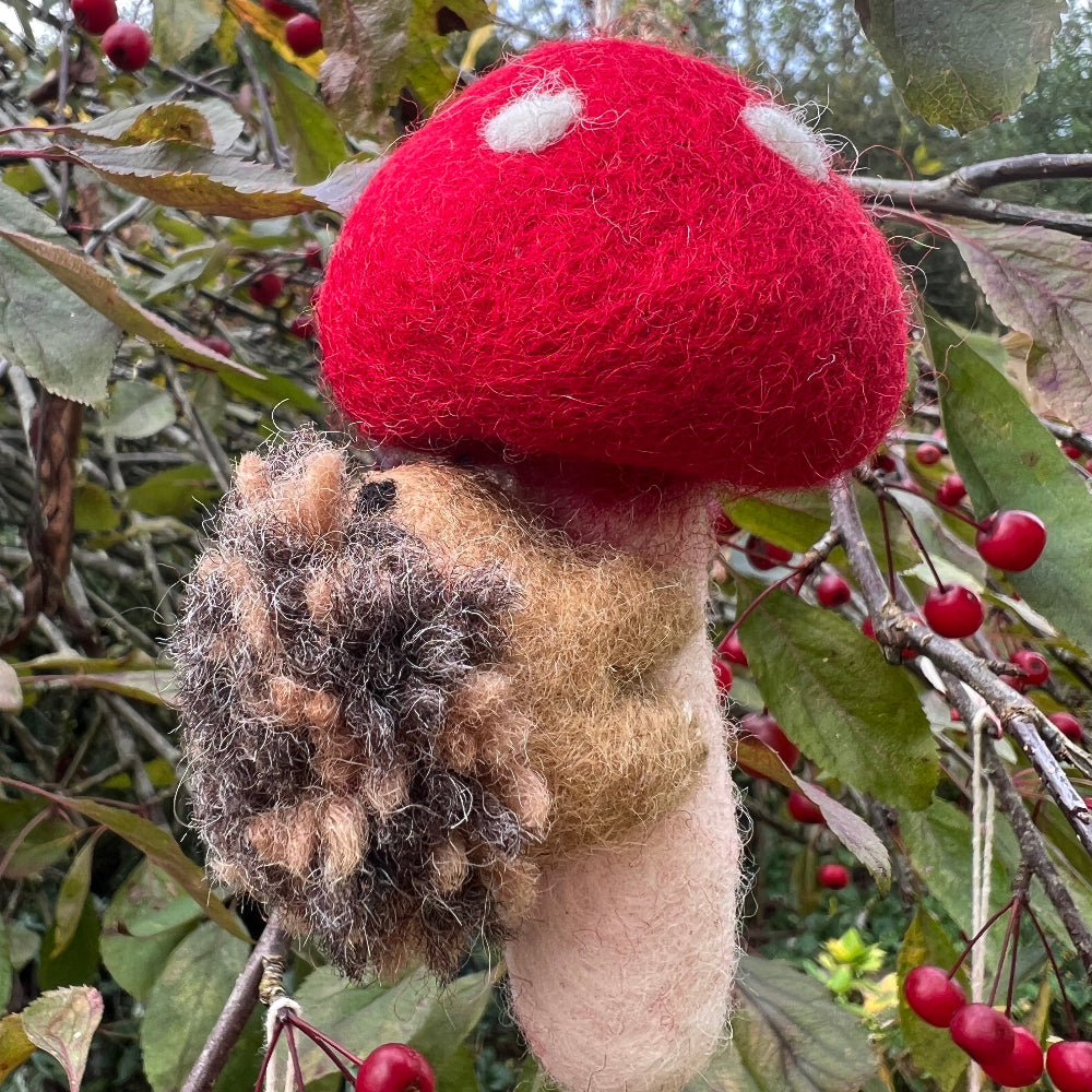 Handcrafted Felted Wool &#39;Woodland Toadstool&#39; with Hedgehog against a tree with red berries