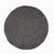 Handcrafted Felted Wool Rugs - Grey by Douée on a natural colour carpet in a room with tables and a natural colour sofa against a neutral wall with a green plant for decoration. 