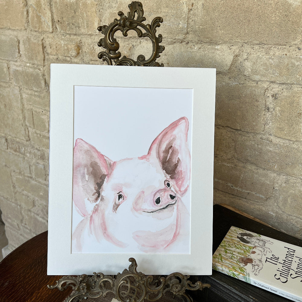 &#39;Sow in Love with You&#39; is a delightful limited edition watercolour print by artist Linda Beazley. Mounted, this artwork brings a splash of joy and elegance to any room. Perfect as a heartfelt gift or a treasured addition to your own collection, it invites you to celebrate love in the most colorful way.

With only a limited number available, now’s your chance to brighten your space with this playful, captivating piece that truly grows on you. Don’t let it slip away! Shown on a brass stand with books.